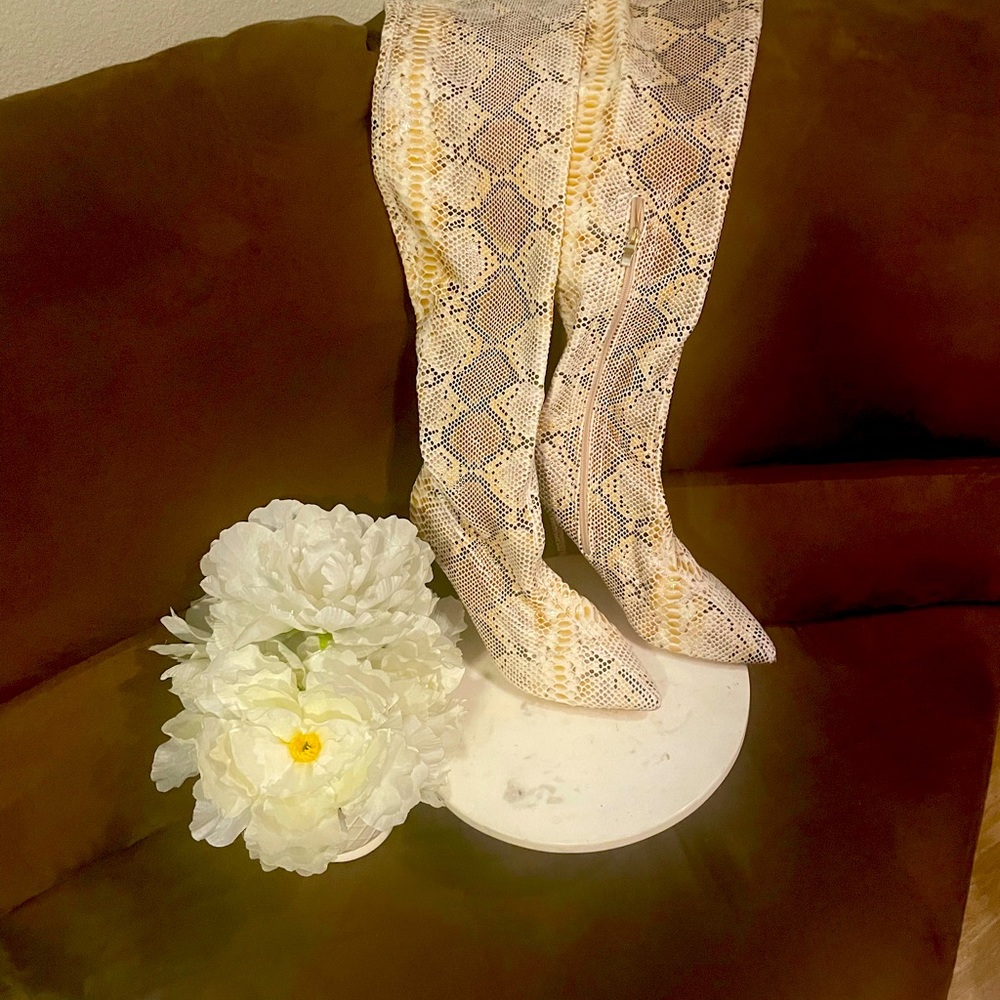 Beautiful, Thigh high snake print boots great for all seasons never worn